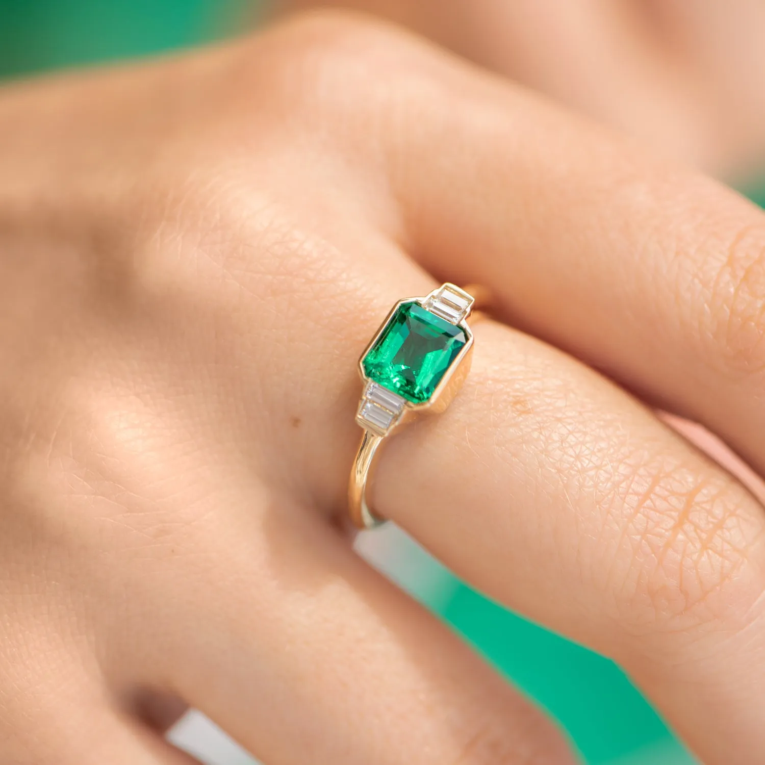 Art Deco Emerald Engagement Ring with Baguette Diamonds